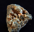 Grupo Mineralógico de Alicante. Analcima. Explotación  de Ofitas. Sierra de Olta. Calpe. Alicante Alicante
