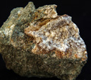 Grupo Mineralógico de Alicante. Analcima. Explotación  de Ofitas. Sierra de Olta. Calpe. Alicante Alicante