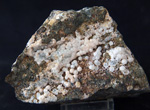 Grupo Mineralógico de Alicante. Analcimas. Explotación de Ofitas en la Sierra de Olta. Calpe. Alicante.   