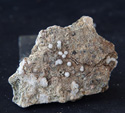 Grupo Mineralógico de Alicante. Analcimas. Explotación de Ofitas en la Sierra de Olta. Calpe. Alicante.  