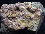 Grupo Mineralógico de Alicante. Analcimas. Cantera  Barranco de la Mola. Sierra de Olta, Calpe. Alicante