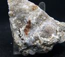 Grupo Mineralógico de Alicante. Prehnita. Cantera  Barranco de la Mola. Sierra de Olta, Calpe. Alicante