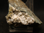 Grupo Mineralógico de Alicante.  Analcimas. Cantera  Barranco de la Mola. Sierra de Olta, Calpe. Alicante 