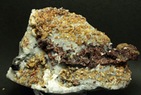 Espinela, clinohumita, forsterita y esfalerita. Cantera Del Barrio. Sierra de Mijas, Mijas, Málaga, Andalucía, España